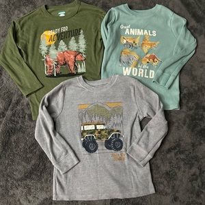 A bundle of size 4T long sleeves.